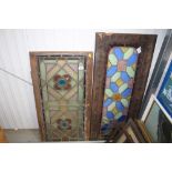 Two oak framed stained glass panels AF