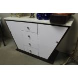 A modern Art Deco style sideboard fitted four draw