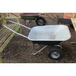 A two wheeled wheelbarrow
