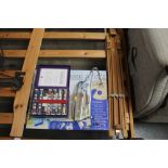 An artist easel and various other artists material