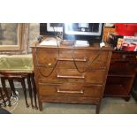 An Art Deco style dressing chest fitted three draw