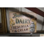 A wooden dairy sign