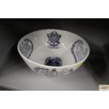 A blue and white bowl decorated with the sailors t