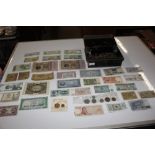 A cash tin and contents of various coinage and ban