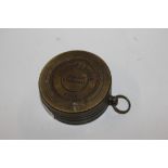 A brass sundial and compass (bears Dolland name and date)