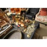 A large quantity of various brass and copperware,