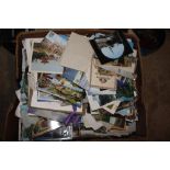 A large quantity of various postcards