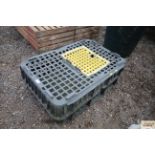 A plastic poultry crate