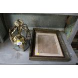 A gilt picture frame together with another picture
