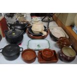 Two Le Creuset cooking dishes, various pottery and