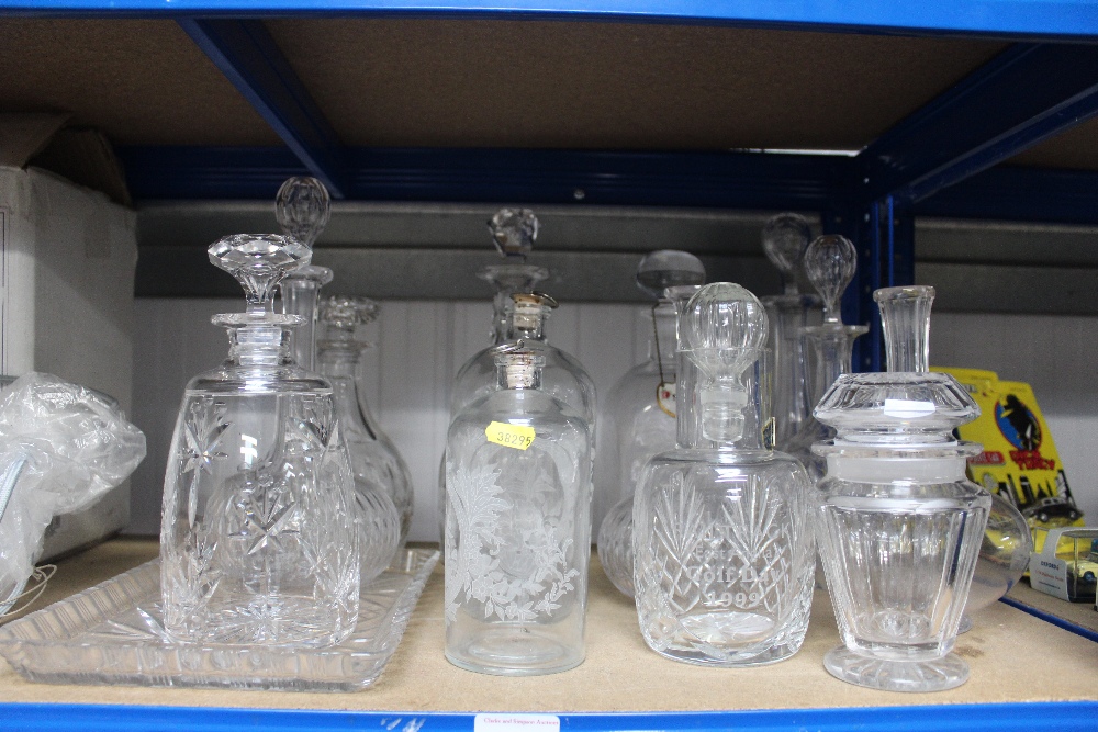 A quantity of various decanters, glass tray etc