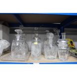 A quantity of various decanters, glass tray etc