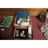 A box containing various medals etc.