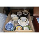 A box containing various plant pots