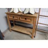 A pine two drawer side table