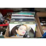 A box of various records to include Madonna, Tubul