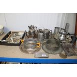 A quantity of silver plated tea pots, trays, pewter tankards and silver plated cutlery etc.