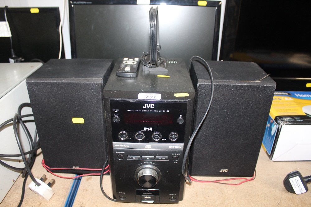 A JVC mini Hi-Fi stereo together with two speakers