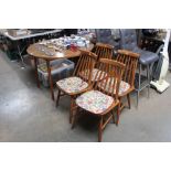 A Dinette folding table together with four chairs