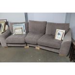 A three seater grey upholstered corner sofa