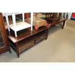 A reproduction mahogany coffee table together with