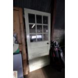 A half glazed wooden door measuring approx. 37" x