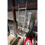 An aluminium extending folding ladder and a set of