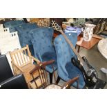 Four blue upholstered button back dining chairs