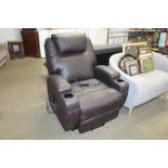 A black upholstered reclining armchair