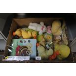 A box containing various decorative Easter related items to include bunny rabbits, ducks etc. some