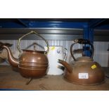 A copper kettle and a copper teapot with brass han