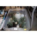 A box containing various glass bottles