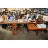 A teak dining table and four chairs