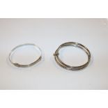 A 1987 London hallmarked bangle and a white metal