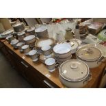 A collection of Denby tea and dinnerware