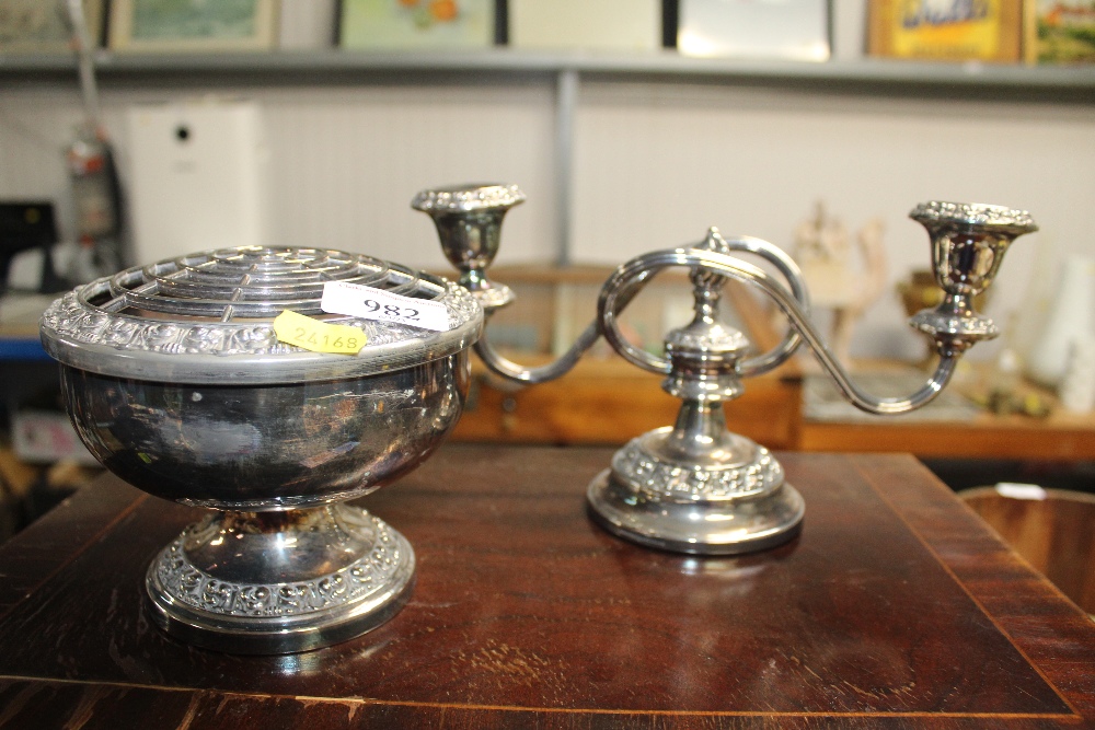 A silver plated rose dish and a candelabra