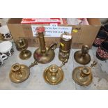 Seven brass candlesticks and a lamp and Limelight