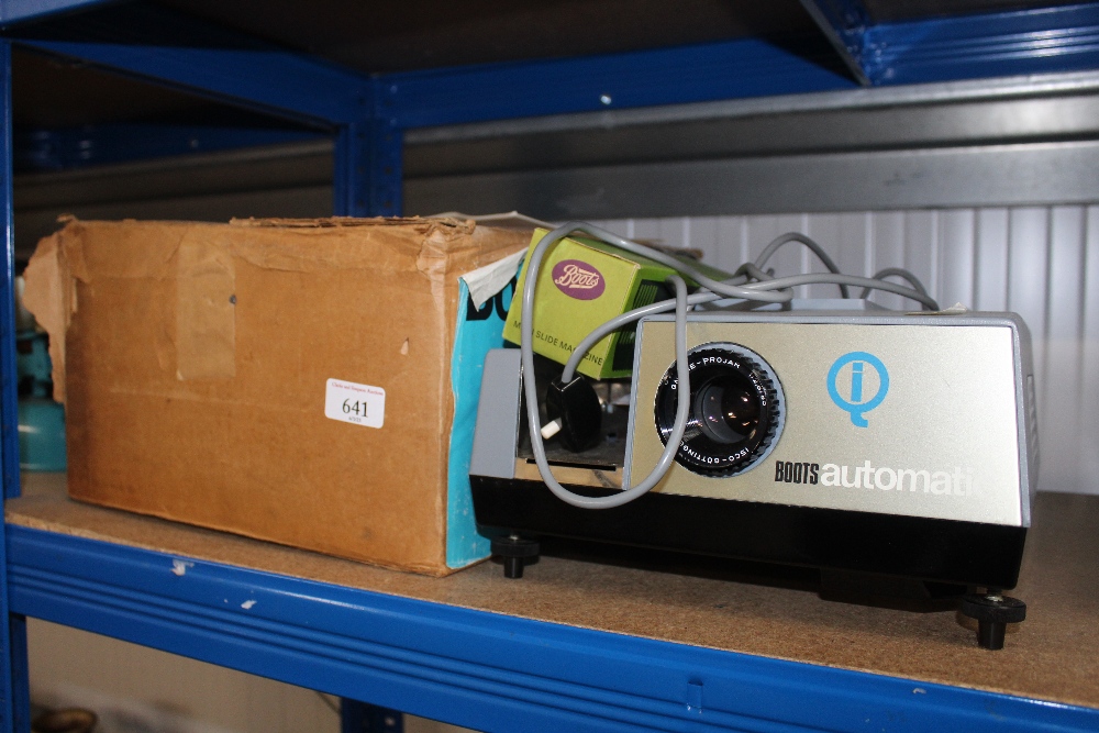 A Botts automatic projector with original box, sol