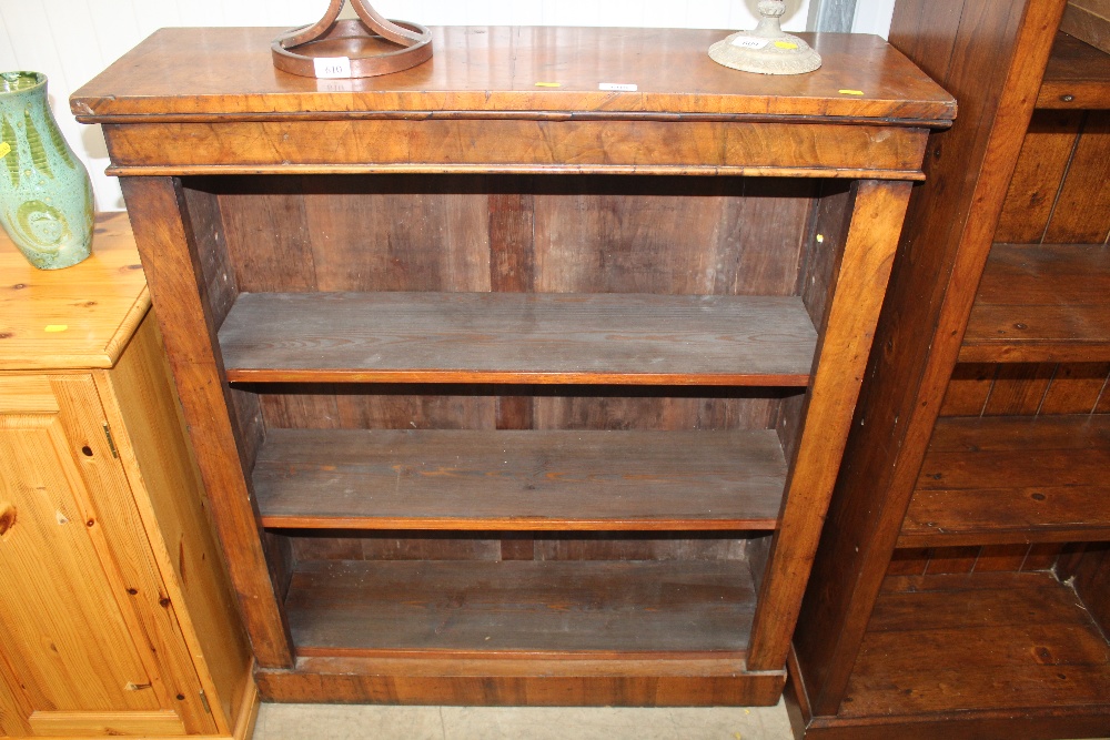 A walnut and pine open fronted bookcase
