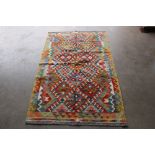 An approx. 5'2" x 3'2" Chobi Kilim rug