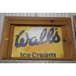 A Walls ice cream advertising sign contained in a