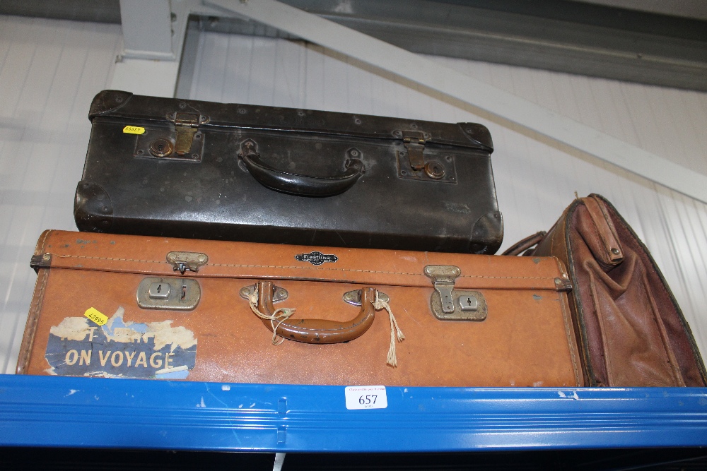 Two vintage suitcases and a a leather satchel