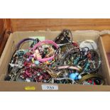 A box of various costume jewellery