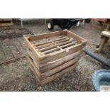 Four wooden apple crates