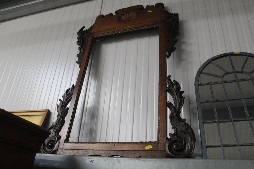 A carved wooden picture frame AF