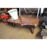 A varnished elm coffee table