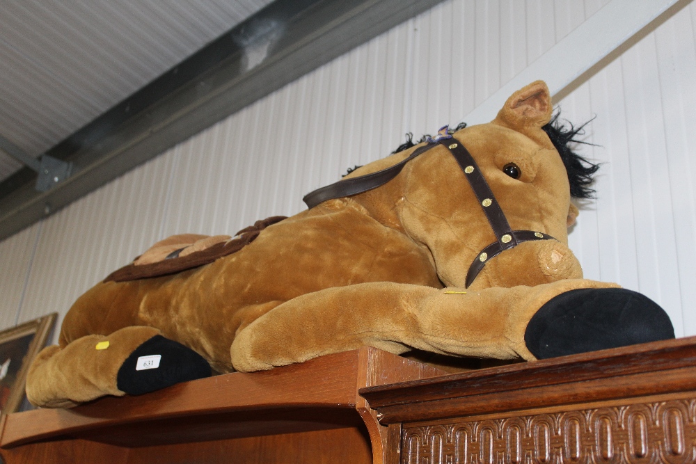 A large stuffed toy in the form of a horse