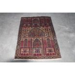 An approx. 4'3" x 2'9" Old Baluchi rug