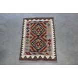 An approx. 2'3" x 1'7" Maimane Kilim Rug