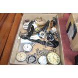 A box of various wrist watches and pocket watches